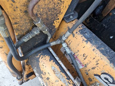 case skid steer bleeding drivelines|case 1840 hydraulic hose problems.